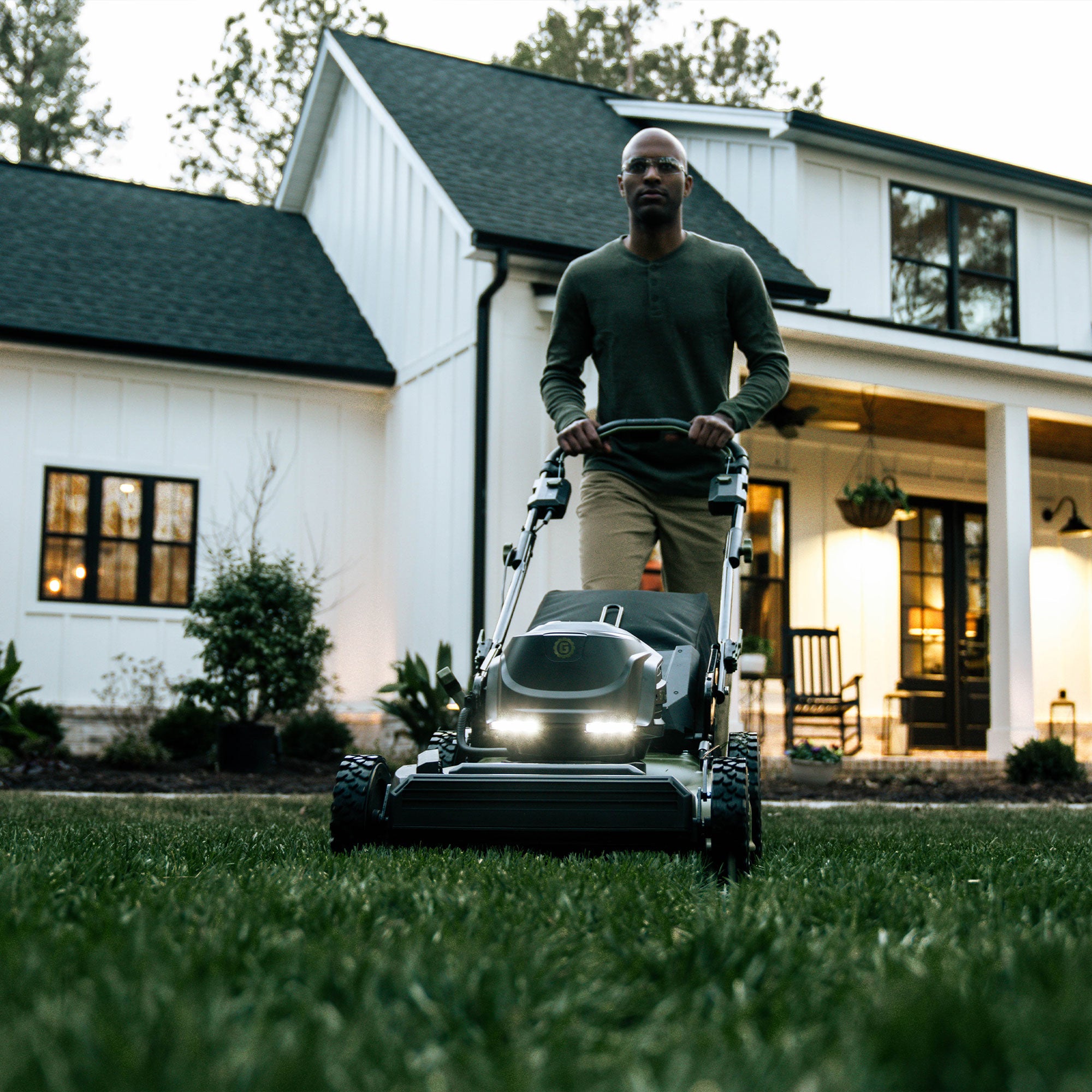 62V Cordless 23" RWD Self-Propelled 3-in-1 High Wheel Walk Behind Mower with (2) 4 Ah Batteries and Charger